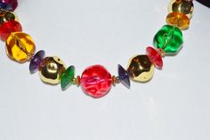 "Retro 60's Chunky Hot Colors & Multi Shape Translucent and Opaque Molded Lucite Beaded Necklace BEAUTIFUL & COLORFUL MOLDED LUCITE BEAD NECKLACE CHUNKY BRIGHT COLORS & MULTI SHAPE TRANSLUCENT & OPAQUE BEADS WITH GOLD TONE SPACERS THE NECKLACE MEASURES 18\" AND IS IN VERY GOOD VINTAGE CONDITION. GREAT FOR THE BEACH & RESORT. SUMMER FUN COLORS. The items pictured is the exact item you will receive. No stock photos are used. Although I am not a gemologist, I make every attempt Retro Round Bead Jewelry For Parties, Retro Round Beads Jewelry For Party, Retro Beaded Jewelry For Party, Vintage Beaded Necklace With Large Beads For Party, Retro Beaded Party Jewelry, Party Costume Jewelry Beaded Necklace With Large Beads, Party Costume Jewelry With Large Beaded Necklace, Party Costume Jewelry With Large Beads Necklace, Party Costume Jewelry With Large Beads