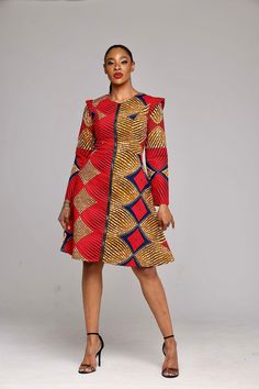 This African print handmade versatile piece was made to help you be stylish and comfortable. It could be worn as a dress, tunic or jacket. Wear it as a light jacket during summer, pair it up with some pants and you are good to go during the colder months. Fully lined 100% cotton wax Cap sleeves on long sleeves Front zipper Two-side pockets Length: 40 inches long Gold, red and navy blue Care instructions Hand wash with cold water Could be dry cleaned Low iron Simple Ankara Styles, African Wear For Ladies, African Print Jacket, African Attire Dresses, Short African Dresses, Latest Ankara, African Dresses Modern, African Wear Dresses, African Fashion Modern