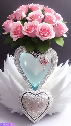 pink roses in a heart shaped vase with angel wings