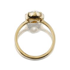 1.75ct Pear Cut Diamond Ring in 18kt Gold Collet Setting The Allie 1.75 ring is a VB original design made right here in NYC. The ring centers a GIA-certified 1.75-carat Pear cut diamond of M color, VS2 clarity. The stone is set in an 18kt yellow gold collet setting. The ring is currently sized 6+ and can be resized! Why We Love It This chunky antique pear began life in an Edwardian necklace and now this bright and beautiful stone shines in her golden collet setting. This antique pear diamond is Yellow Gold Halo Ring With Rose Cut Diamonds, Proposal Pear-shaped Rose Cut Diamond Ring, Pear-shaped Sapphire Ring With Rose Cut Diamonds, Timeless Pear-shaped Rose Cut Diamond Jewelry, Marquise Brilliant Cut Proposal Ring, Timeless Pear-shaped Diamond Ring With Vvs Clarity, Timeless Pear-shaped Rose Cut Diamond Rings, Classic Cluster Ring With Rose Cut Diamonds, Yellow Gold Sapphire Ring With Marquise Cut Rose Diamonds