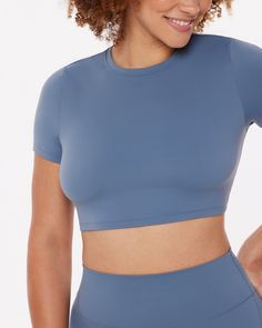 Your dreamiest casual crop top—a buttery-soft short-sleeve tee for feeling wrapped up in luxury from running errands to all-day movie marathons. Features a classic crew neckline and light compression with a smooth body-hugging feel.-->✦LUXECLOUD COLLECTION✦ Easy to put on styles you’ll never want to take off. Feels-like-nothing fabric and flattering silhouettes for all-day, everyday comfort.✦KEEP IT LIGHT✦ Buttery soft with a luxe feel for coffee-shop dates, catching flights, and golden-hour wal Catching Flights, Athleisure Shorts, Crop Top Casual, Movie Marathon, Crop T Shirt, Dangle Necklaces, Marathons, Soft Shorts, Crop Tshirt