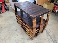 a table made out of wine racks in a garage