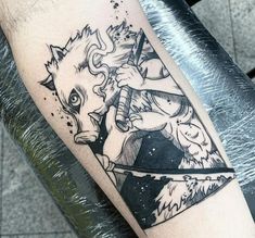 a black and white tattoo on the leg of a man with an arrow in his hand