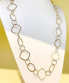 Everyday Gold Loop Long Necklace: a fusion of modern design and timeless allure. Crafted with precision from premium stainless steel and bathed in a luxurious gold plating, this necklace offers a contemporary open-link style that exudes both simplicity and sophistication. Its adjustable longer-length ensures the perfect drape for every neckline, while the sturdy lobster clasp ensures a secure fit. Whether worn as a single long strand or wrapped around for a dynamic layered look, this necklace pr Modern Yellow Gold Necklace For Everyday, Modern Brass Jewelry With Oval Link, Gold Stainless Steel Jewelry With Rectangular Links, Modern Brass Jewelry With Rectangular Links, Modern Yellow Gold Jewelry, Modern Gold Plated Chain Link Jewelry, Modern Round Chain Necklace For Formal Events, Rectangular Links Jewelry In Yellow Gold Stainless Steel, Modern Gold-plated Chain Link Jewelry