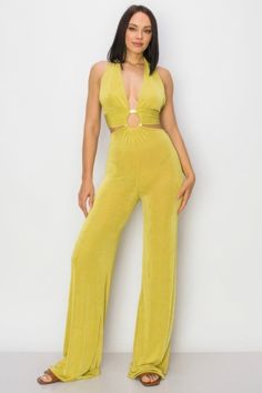 Elevate your style with our Solid Slinky Wide Legs Jumpsuit in vibrant lime green. This chic piece combines a sleek, wide-leg silhouette with a modern o-ring detail, making it a standout choice for any occasion.Key Features:- Fabric: Made from 96% polyester and 4% spandex, offering a smooth and stretchy fit that drapes beautifully.- Fit: True to size with a relaxed, wide-leg design for a flattering and comfortable silhouette.- Color Options: Available in eye-catching lime green.- Sizes: Offered Purple Jumpsuit, Layered Cami, Layered Fits, Verde Lima, Jumpsuit Elegant, Activewear Sets, Leg Design, Wide Legs, Wide Leg Jumpsuit