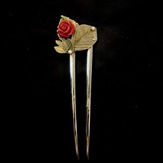 Pieces are attached using a special jewelry adhesive. Please read descriptions thoroughly for sizes and materials.  This is an eye catching u shaped gold metal hair fork with a dainty red reconstituted stone rose flower, with bronze leaves in back and faux pearls. It is a really fun way to dress up any bun hair style! The fork is just over 4 3/4" long, with the prongs being 3 1/2" long, and it is just under 1 1/2" at it's widest. Check out my shop for more hair pins, forks, and all sorts of fun Hair Pin Bun, Flowers For Hair, Hair Accessories Bun, Bronze Hair, Bun Holder, U Shaped Hair, Hair Fork, Metal Hair, Rose Rouge