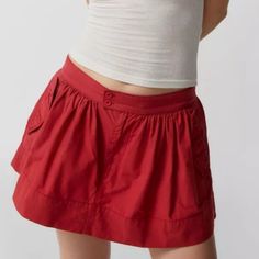 This Mini Skirt By Bdg From Urban Outfitters Features A Low-Rise, A Double-Button Closure, An A-Line Silhouette, Two Side Pockets, And Cotton Twill Fabrication. Style: Belle Color: Red Size: Xs Same Or Next Day Shipping High Waist Casual Cargo Skirt For Day Out, Casual Red Skort For Day Out, Casual Red Mini Length Bottoms, Casual Cargo Skirt For Day Out, Casual Skort With Button Closure For Day Out, Red Skort With Pockets For Spring, Red Button Closure Bottoms For Summer, Casual Summer Skort With Button Closure, Red Summer Bottoms With Button Closure