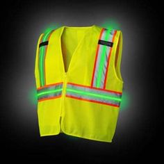 Keep yourself protected with this SV400 high-vis rechargeable lighted safety vest. Yellow mesh polyester with sewn-in bands of glow-in-the-dark phosphorescent fabric recharges with any light source. A rechargeable, removable LED safety light strip and dual light modes deliver optimal visibility in lowlight settings. To provide plenty of room for smart phones, pens, notes, and other items, it comes with two shoulder-mounted mic tabs and chest pockets. Size: xl. Color: High-Vis Yellow Vest with Or High Visibility Clothing Women, Black Windproof Functional Vest, Orange Construction Vest, High Visibility Vest, Yellow Vest, Personal Safety, Safety Lights, Safety Vest, Orange Accents