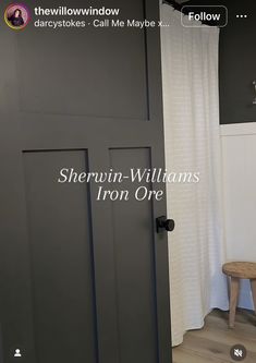 there is a black door with the words sherylin - williams iron one on it