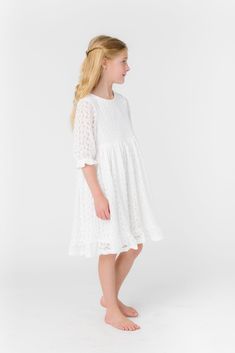 All over lace girl's dress 1/2 length sleeves Round neckline Gathered waist Button back closure Fabric content - Cotton - Dry clean only Short Sleeve Lace Dress For Confirmation, Short Sleeve Lace Confirmation Dress, Spring Lace Dress For Confirmation, Spring Lace Dress With Half Sleeves, Spring Lace Dresses With Half Sleeves, Spring Half-sleeve Lace Dresses, Spring Confirmation Lace Dress, Spring Dresses With Lace Short Sleeves, Summer Lace Dress With 3/4 Sleeves