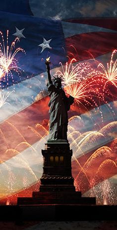 the statue of liberty is lit up with fireworks in front of an american flag background