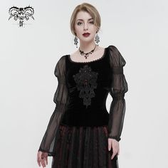 A Gothic Velvet Top.It features mesh lantern sleeves and a square neckline.The centre front is decorated with appliqued lace motif.The cuffs and the neckline are bordered with minimalistic gothic lace. Product specifications:Style: GothicMaterial: POLYESTER 95%, SPANDEX 5% Velvet Applique, Gothic Mode, Floral Embroidered Shirt, Rock Style Outfits, Rock Style Clothing, Fitted Blouse, Black Pants Men, Rock Outfit, Gothic Vintage