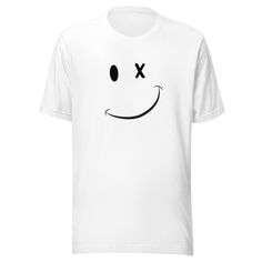 "Wink Emoji" - the perfect T-shirt for any occasion! Whether you're looking for a funny gift for a geeky friend, a retro-inspired tee for yourself, or a unisex top for the whole family, this Wink Emoji T-shirt is sure to bring a smile to everyone's face. This T-shirt is the perfect way to express emotion without saying a word. With its iconic wink emoji design, it's sure to make a statement. It's a great way to show your optimism and happy attitude, and it's sure to be a hit with men, women, and White T-shirt With Funny Text For Streetwear, Unisex White T-shirt With Funny Print, Funny White T-shirt With Screen Print, White Funny T-shirt, Funny White T-shirt With Smiley Face, White Funny T-shirt With Text, Funny White Print Crew Neck T-shirt, Funny White Relaxed Fit T-shirt, Funny T-shirt With White Screen Print