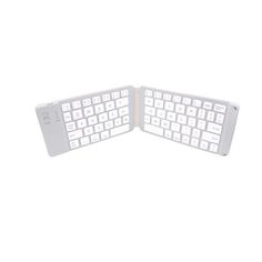 two white keyboards sitting next to each other on top of a white surface with the keys missing