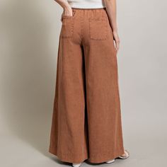 Work appropriate + a staple piece that is perfect for any occasion or age range! These chambray pants feature a wide leg style, no holes/distressing, elastic waistline, functional drawstring, hip and back pockets. These pants are perfect for the workplace + easy to dress up with a cute blouse, or dress down with your school t-shirt! Made of 100% cotton. Run true to size. Also come in denim.