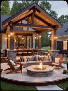 an outdoor living area with seating and fire pit