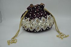 Stone Royal white Handcrafted pearl beaded clutch portly bag, Embroidered Potla Bag, Handbag, Wedding Purse, Wedding Gifts, Bridesmaid Gift Multi-function: Velvet is used on the inside to keep your belongings safe. - Magnetic lock closure easy to open and off. - Removable golden sling chain (would not pull your hair and dress) - Designer Dragon clasp. it can make the clutch to be a handbag cross body bag or shoulder bag. This statement clutch is a true example of exquisite Indian craftsmanship. It is handmade with love by our local Indian artisans.  - Front and back same as is design Dimension: Professional size.      lenth.c.m.        | wirth.c.m.              | hightc.m.       Weight approx.                     KG. Space inside:        Your daily belongings and cell mobile, keys, cards, Handheld Pearl Embroidered Evening Bag For Weddings, Handheld Pearl Embroidery Evening Bag For Wedding, Handheld Evening Bag With Pearl Embroidery For Wedding, Traditional Formal Bags With Pearl Embroidery, Formal White Embroidered Bags, Formal White Embroidered Bag, Pearl Embroidered Potli Bag For Reception, Traditional White Embellished Potli Bag, White Embroidered Potli Bag For Evening