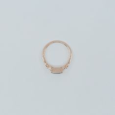 The Maggey ring is like an old soul, a classic beauty with hints of the modern woman. This up-to-date vintage inspired ring can be worn as an alternative engagement ring, or as an everyday ring. Details: 14k gold (available in rose, white or yellow gold)Emerald cut Blue Sapphire is 5.5mm x 4mm Tapered diamond baguettes about 2.5x1.4mm Also available in Green and Pink Tourmaline (please see other listings) Free Shipping on Domestic Orders Materials: Sapphire, diamond, 14k gold, blue sapphire Need White Gold Sapphire Ring, An Old Soul, Vintage Inspired Rings, Alternative Engagement Ring, Gold Chain Choker, Dainty Choker, Diamond Stacking Rings, Everyday Ring, Blue Sapphire Ring