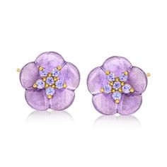 It'll always feel like spring when you don these pretty flower earrings! The pair blossoms with 5.50 ct. t.w. amethyst flowers adorned with .30 ct. t.w. tanzanites in polished 18kt yellow gold over sterling silver. Post/clutch, tanzanite and amethyst flower earrings. Amethyst Flower, Amethyst Birthstone, Flower Carving, Amethyst Color, Pretty Flower, Sterling Jewelry, Flower Pendant Necklace, Amethyst Jewelry, Floral Necklace