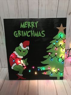 a christmas card with an image of a grino standing in front of a tree