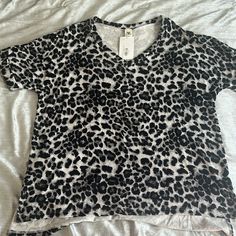 Black, Grey, & White Leopard Print V Neck Tshirt. New With Tags. Cuffed Sleeves. Oversized Black Oversized V-neck T-shirt, Leopard Print Short Sleeve Top With Relaxed Fit, Leopard Print Tops With Relaxed Fit And Short Sleeve, Leopard Print Relaxed Fit Short Sleeve Tops, Relaxed Fit Leopard Print Tops With Short Sleeves, Casual Leopard Print Top With Relaxed Fit, Casual Short Sleeve Leopard Print Top, Leopard Print Short Sleeve Graphic Tee, Casual Leopard Print T-shirt With Relaxed Fit