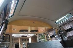 the inside of a bus with its doors open