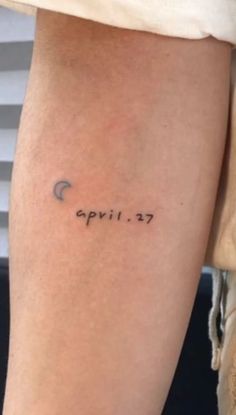 a person with a tattoo on their arm that reads, ephi - zy