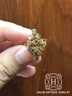 Antique Polki Diamond Ring. It's antique ring crafted by hand over 60 years old. - Polki Diamond - Material : gold - Total Wt. : 2.8 g. - Size : 5 us Please contact us if you want to adjust the ring size. Can adjust the ring size for free 1-2 size It takes about 5-10 days to adjust the size. **Ship with DHL insured according to product value for free.** *Please contact us if you have any questions.* ABOUT PERANAKAN JEWELRY Peranakan jewelry is rare and skilfully crafted traditional gold providing a pedestal for Diamond and other precious stones to be mounted on. Each crafted piece holds the mystery of the individual who owns it and embraces an era in Baba history. Peranakan jewelry is fashioned with influences from the Malay Archipelago, Asia, China, Europe, Anglo-Indian, and Victorian Eng Malay Archipelago, Antique Ring, Victorian Rings, Ring Crafts, Valentines Jewelry, Diamond Cluster Ring, Engraved Rings, Antique Rings, Over 60