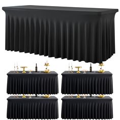 a set of four tables with black tablecloths and gold candles