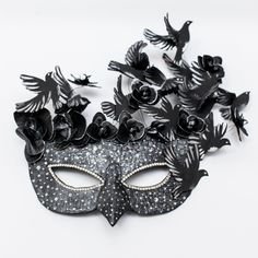 A chic mask for a woman in an elegant romantic style. The mask is embossed to simulate a leather pattern and a scattering of rhinestones. Flying away birds decorate the top of the mask and add a magical mystery to the image. Black orchids add sophistication to the look. The design was developed by us, from the base of the mask to the final touch. And rather You will be the only owners of such masks at the event, because we are a small studio and produce a limited number of designer masks. The ma Woodland Masquerade, Masks Venetian, Masquerade Mask Women, Masks Design, Mask Woman, Couples Masquerade Masks, Butterfly Halloween, Mardi Gras Masks, 3d Bird