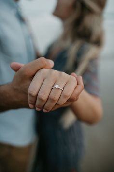 a man pointing his finger at the camera