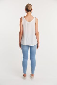 We love our basics! They are our wardrobe staples and are the go to fashion reliable faves. This Basic Tank is the perfect addition, as you can layer it with any outfit or wear it under a cardigan or sweater. This Basic Tank can also be worn on its own as the weather gets warmer. Versatile White Tank Top For Layering, Chic Spring Tank Top For Layering, Fall Day Out Viscose Tops, Chic Spring Layering Tank Top, Simple Relaxed Fit Tops For Layering, Versatile White Everyday Top, Versatile Tank Top For Fall Layering, Versatile White Top For Everyday, Versatile White Tops For Everyday Wear