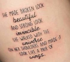 the back of a woman's thigh with words written on it