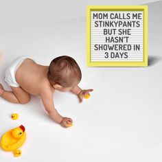 a baby in diapers with rubber ducks around it and a sign that says mom calls me stinky pants but she hasn't showed in 3 days