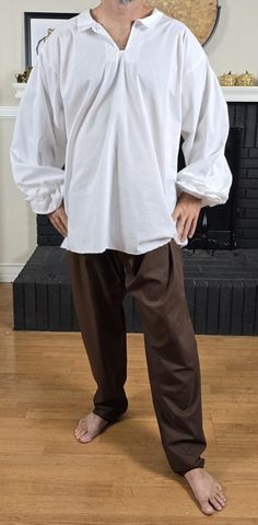 Mens Cotton shirt for renaissance peasant costume. Simple Ren Faire Outfit Men, Traditional Long Sleeve Tops For Larp, Medieval Style Fitted Long Sleeve Top, Guy Ren Faire Outfit, Peasant Style Long Sleeve Cotton Tops, Peasant Long Sleeve Cotton Tops, Long Sleeve Cotton Peasant Tops, Fall Peasant Top Relaxed Fit, Fall Peasant Top With Relaxed Fit