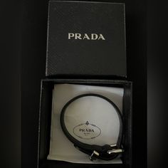 Authentic Brand New Prada Miu/Miu Bracelet. This Bracelet Has Never Been Worn. Questions? Leave A Comment Below! Happy Poshing Designer Leather Bracelets, Designer Black Leather Strap Bracelets, Designer Black Bracelets With Leather Strap, Designer Jewelry With Leather Strap As Gift, Designer Leather Bracelet For Formal Occasions, Designer Adjustable Leather Bracelet, Designer Formal Bracelets With Logo Charm, Modern Formal Bracelet With Logo Charm, Modern Formal Bracelets With Logo Charm