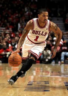 a basketball player dribbling the ball during a game