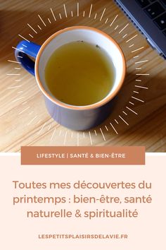 a cup of tea sitting on top of a wooden table