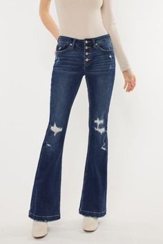 Description These Liv Button Fly Flare Jeans will totally liven up your wardrobe! With a mid rise and petite fit, you'll be rockin' a perfect silhouette for any occasion. Their dark wash denim with distressed, button fly details? They'll bring you nothing but good jeans vibes! Get ready to fly high in your newest pair of flares! Specs 78% Cotton | 16% Polyester | 4% Rayon | 2% Spandex KanCan Jeans Machine wash inside out Tumble dry low Stretch material 9 1/4" rise, 32" inseam | measured in size 5/26 SKU#: IS-003271 Please note that all online inventory reflects inventory in store. Good Jeans, Kancan Jeans, Flat Hair, Fly High, Best Jeans, Sweater Making, Dark Wash Denim, Flare Jeans, Jumpsuit Romper