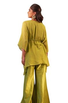 Lime kaftan featuring sequin hand embroidered neckline with tassel tie up waist. Paired with a flared pant. - Aza Fashions Green Tassel Sets For Eid, Green Tassel Set For Eid, Summer Festive Kurta With Back Tassel Tie-up, Summer Palazzo Set With Tassels, Green Kaftan, Pant Women, Pant For Women, Embroidered Neckline, Bat Wings