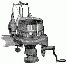 an old fashioned spinning machine with two bottles on it's top and one in the middle