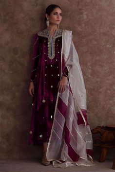 Velvet long kurta with straight silk pant,kurta has beautiful sequin ,beads hand embroidery over the neck and sleeves with small motifs all over the front. It has beautiful two shades organza dupatta to complete your super stylish look for any party or wedding. There will be lining under the velvet top ✨This dress can be customise in any other colour and in all size, please contact us regarding any changes if you want.We will make this dress as per customer requirement. ✨ Our dresses take little Festive Velvet Kurta, Anarkali Style Long Sleeve Velvet Kurta, Velvet Anarkali Kurta With Long Sleeves, Bollywood Velvet Sets With Long Sleeves, Elegant Velvet Kurta With Mirror Work, Party Velvet Kurta With Mirror Work, Designer Long Sleeve Velvet Salwar Kameez, Designer Velvet Traditional Wear With Long Sleeves, Diwali Velvet Kurta With Mirror Work