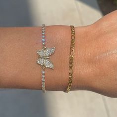 Obsessed with our beautiful gold slider bracelets. Mix 'em, match 'em, love 'em! These have adjustable beads on the back, making them super easy to slide on and off the wrist-will fit any size wrist! 14k gold plated over copper Best to remove when showering or swimming Gold Bracelets With Sliding Knot For Friendship, Gold Sliding Knot Friendship Bracelet, Adjustable Tennis Bracelet For Everyday, Adjustable Gold Tennis Bracelet For Everyday Wear, Gold Friendship Bracelets With Adjustable Length, Adjustable 14k Gold-filled Bracelet, Trendy Gold Bracelet With Sliding Knot, Gold Tennis Bracelet With Adjustable Chain, Dainty Tennis Bracelet With Adjustable Chain