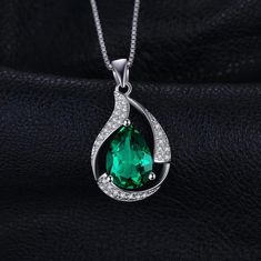 (Product Details)  Main stone - Lab Created Emerald Jewelry Type - Pendant Gemstone Shape - Leaf Shape Material - 925 Sterling Silver Gender - Women And Girl  Metal Purity - 925 Color - Green Lab Emerald In Sterling Silver 925 Pendant with Rhodium Plated....                                                     (Products details In few Words) This Pendant in sterling silver 925  with Lab Emerald for women & girl The stone of ring is Lab Emerald, this is pear cut stone, the lab emerald is very clear and very good The setting to hold the stone is prong setting which is very beautifully done by us, this setting is very safe to hold the stone Add this beautiful piece to your loved one's jewelry collection and have peace of mind every time she wears it                                          STA Russian Emerald, Emerald Pendant Necklace, Emerald Necklace Pendant, Silver Pen, Pear Pendant, Gemstone Choker, Wedding Pendant, Drop Pendant Necklace, Neck Jewellery