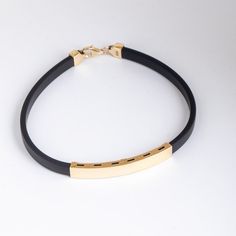 Metal Bracelet With Black Band, Minimalist Black Band Bracelet, Everyday Black Bracelet Jewelry, Everyday Black Band Bracelet, Elegant Gold Bracelet With Black Band, Adjustable Gold Jewelry With Black Band, Gold Leather Bracelet With Black Band As Gift, Gold Leather Bracelet With Black Band For Gift, Gold Jewelry With Black Band As Gift