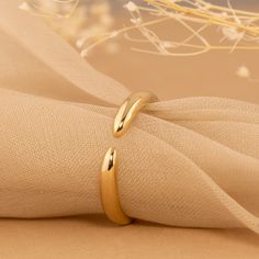 Marina Made to stay - a solid 14K gold claw ring that is created with you in mind. This dainty piece is a great option for everyday wear and can also be worn as a pinky ring. Pick your favorite from Yellow, White, and Rose Gold. - Handmade- Solid Gold- Band Dimension: 2.5 mm Width All pieces come beautifully boxed in suede pouches you can always use when traveling! Claw Ring, Solid Gold Band, Pinky Ring, Gold Band, Gold Bands, Yellow White, Solid Gold, Platinum, Everyday Wear