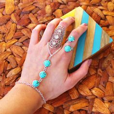 Lots of pretty boho jewels that would make the perfect Christmas gift for your bohemian friends! Here is our Zelda ring with Skye hand chain & ring. #bohemian #turquoise #bohojewelry #jewelry #statementring #rings #christmasgifts #giftideas #christmasgiftsideas #giftsforfriends #bohemianjewelry #statementjewelry #handchain #uniquejewelry #turquoisejewelry #slavebracelet #gypsy #festival Fall Wedding Shoes, How To Wear Headbands, Zelda Ring, Turquoise Bracelets, Boho Jewels, December Birthstone Jewelry, Jewerly Making, Lace Wedding Invitations, Ring Turquoise