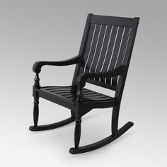 a black rocking chair on a white background