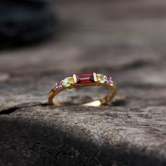 Natural Garnet & Peridot Ring, Amethyst Ring, 18k Gold Vermeil Ring, Multi Gemstone Ring, Dainty Promise Ring, Weeding Ring, Bohemian Ring Gemstone: 1) Natural Amethyst 2) Natural Peridot 3) Natural Garnet Gem Color: 1) Purple 2) Green 3) Red  Gem Shape: 1) Baguette 2) Round 3) Round Metal: 925 Sterling Silver Purity: 925 Parts Per 1000 Setting Type: Prong Set Silver Polish: High Ring Size: All Size Available Please note that there Can be slight variations in stone texture and color shades in th Yellow Gold Garnet Rings With Gemstone Accents, Garnet Multi-stone Anniversary Rings, Multi-stone Garnet Rings For Anniversary, Multi-stone Ruby Ring Fine Jewelry Gift, Gold Garnet Multi-stone Ring, Multi-stone Garnet Ring In Yellow Gold, Yellow Gold Garnet Multi-stone Ring, Garnet Gemstone Open Ring, Anniversary Garnet Multi-stone Rings