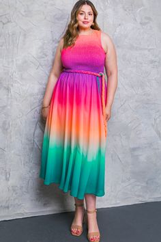 Beat the heat in style with the Maibella Sunset Ombre Midi Dress! This classic summer plus size midi dress is cut from a brightly colored pink, purple and teal ombre fabric. It features a high neckline, a smocked top, a classic a-line skirt and decorative braided belt. This is the ultimate in summer style! Sunset Ombre, Teal Ombre, Ombre Fabric, Ombre Dress, High Neckline, Black Tie, A Line Skirts, The Heat, Round Neckline